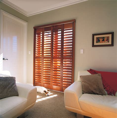 Timber Shutters .